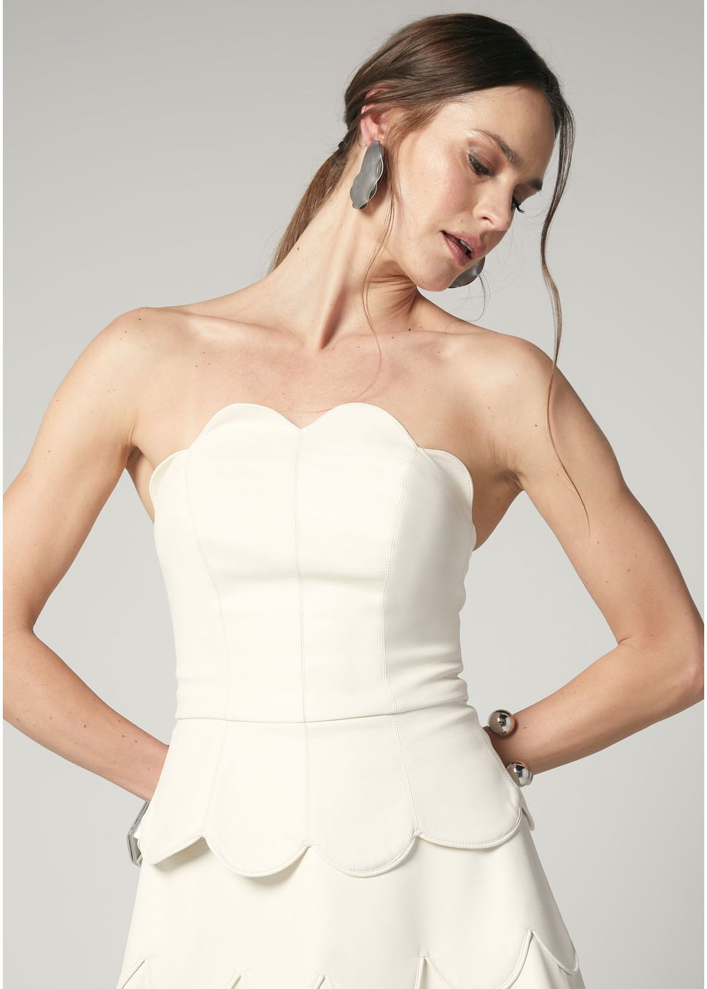 Blusa Peplum em Poliuretano com Detalhe de Ondas Georgina Blusa Peplum em Poliuretano com Detalhe de Ondas Georgina